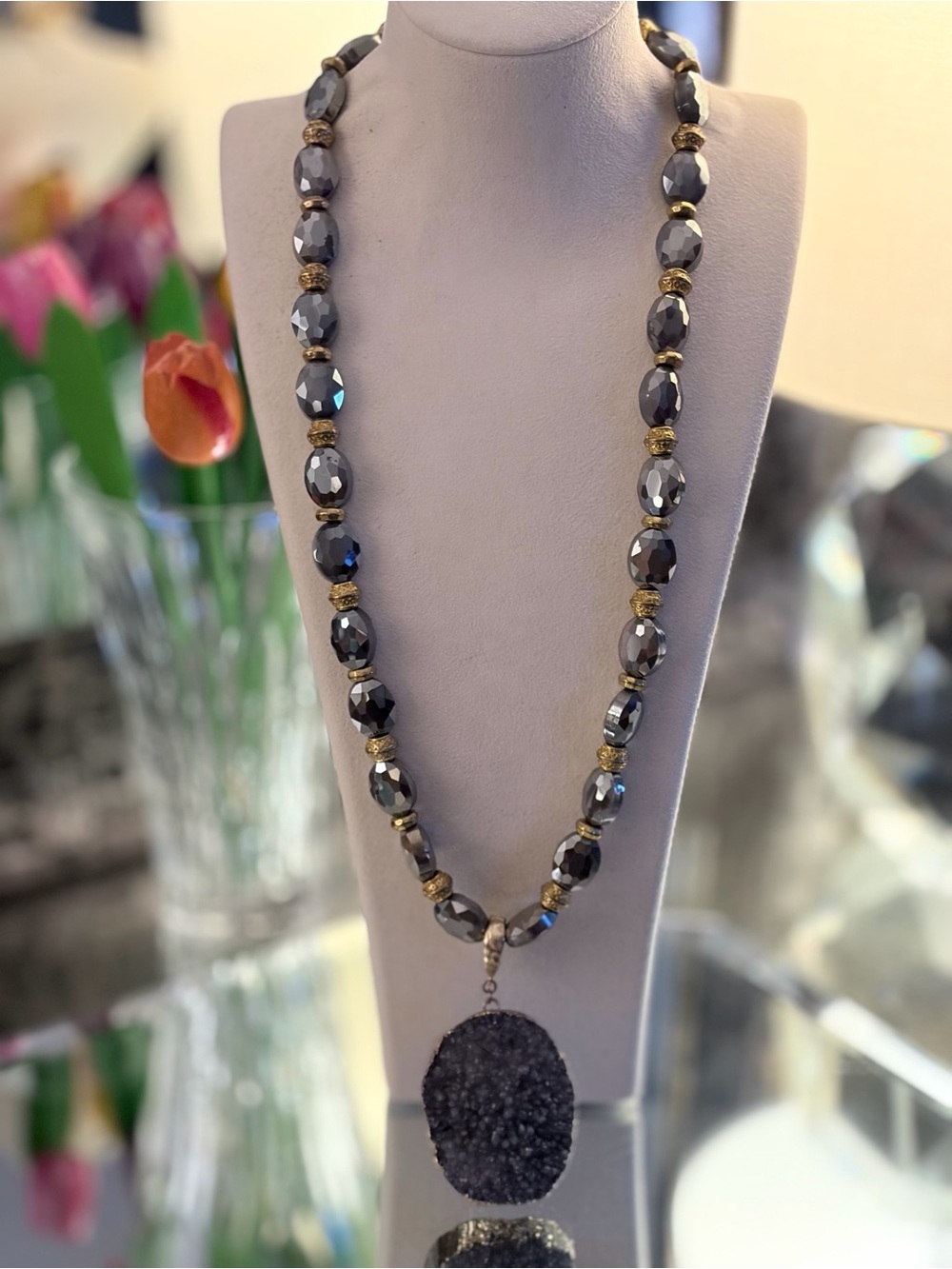Stunning Faceted Hematite Bead Necklace with Gold-Tone Accents and Druzy Pendant